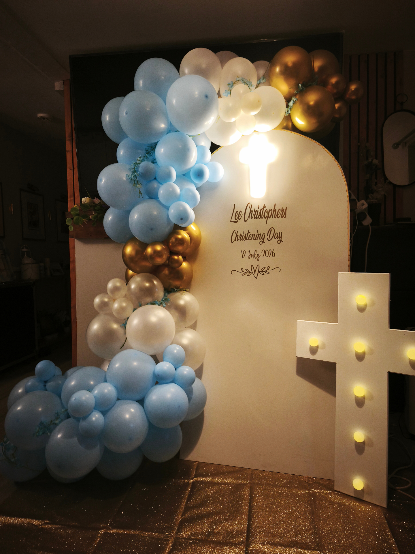 Lee's Christening backdrop with marquee cross
