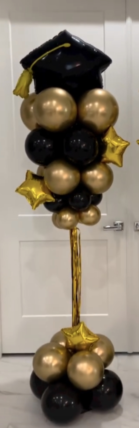 Grad cap column — black & gold with stars