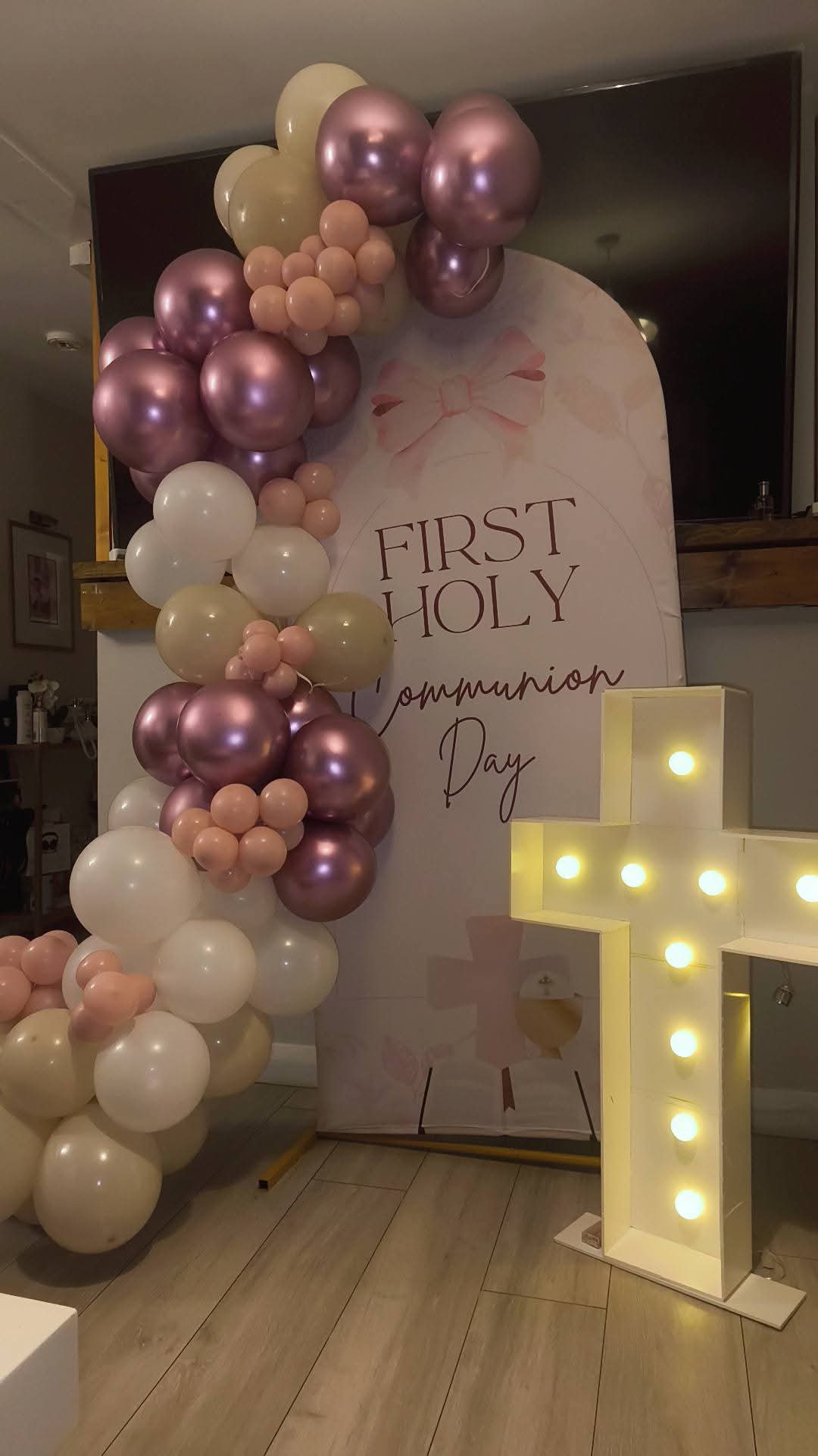 First Holy Communion — rose gold arch & marquee cross