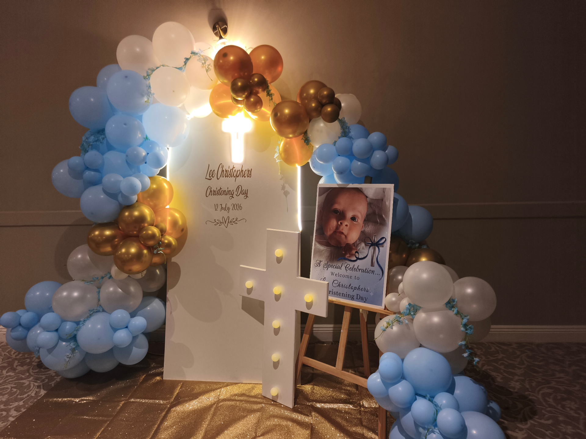 Lee Christophers' Christening — blue, white & gold arch